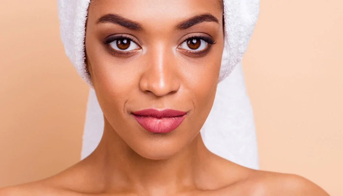 Close-up portrait of a woman facing the camera.