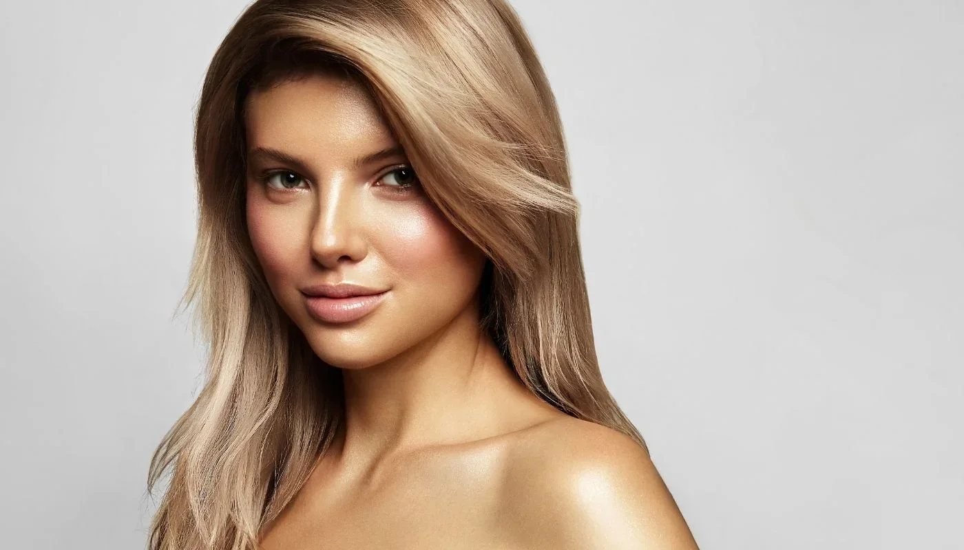 Woman with long blonde hair.