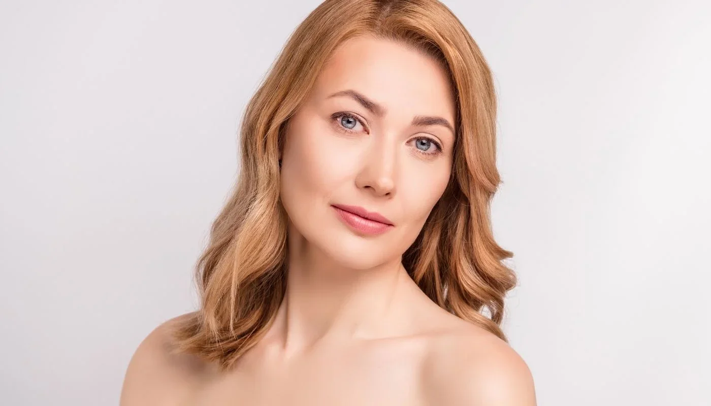 Portrait of a woman with shoulder-length hair.